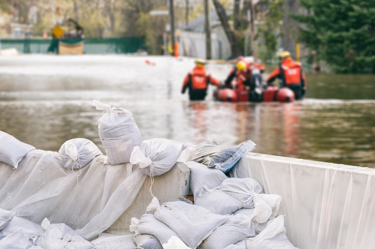 CRF Flood Image – Web_0 Sandbags in a boat as a river is flooding